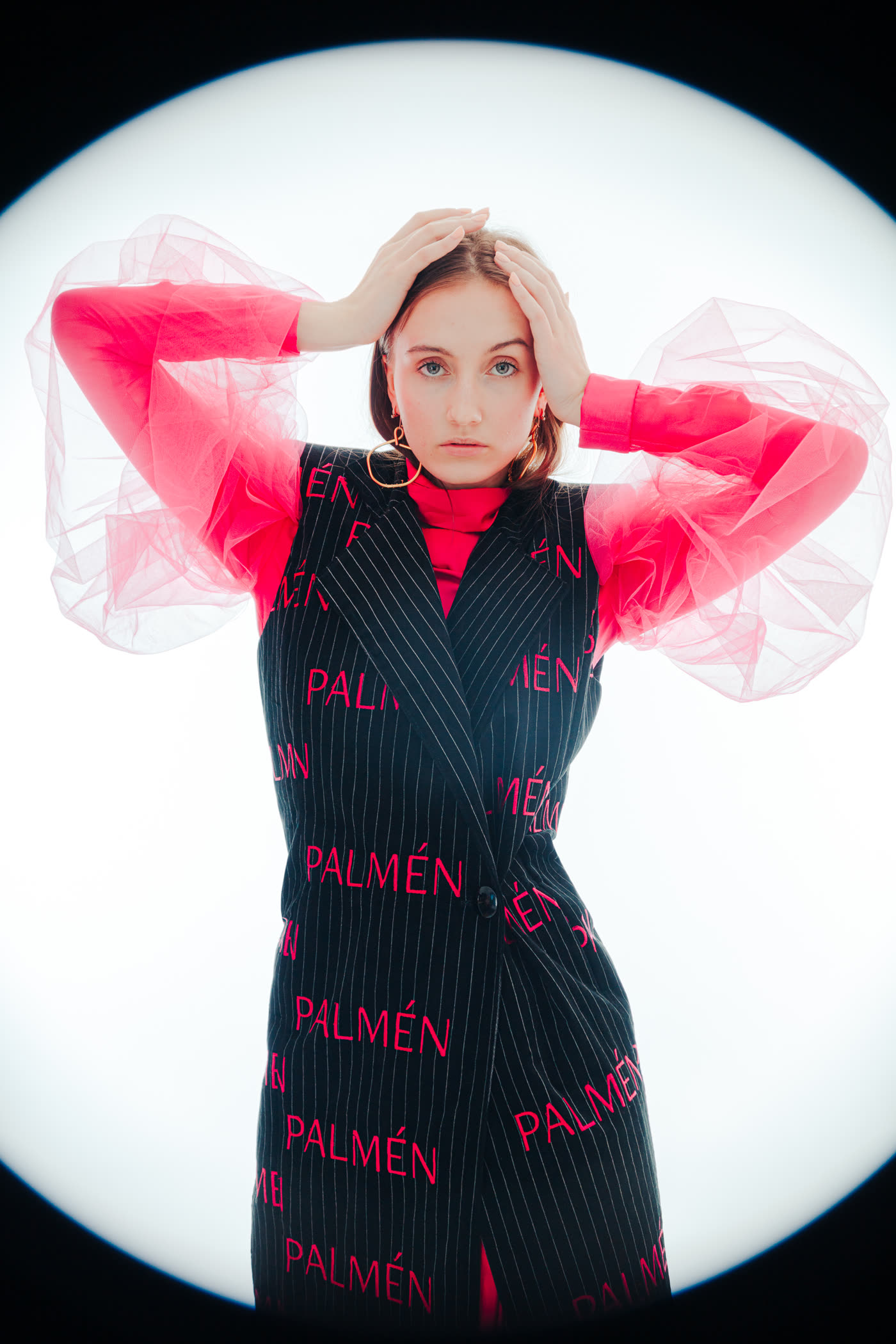 Editorial portrait in a black and pink Palmén garment